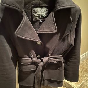 Woman’s black winter jacket